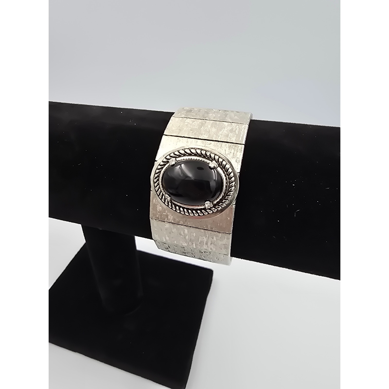 Vintage Silver Tone Flexible Band Bracelet Black Cabochon Stone Fold Over Clasp